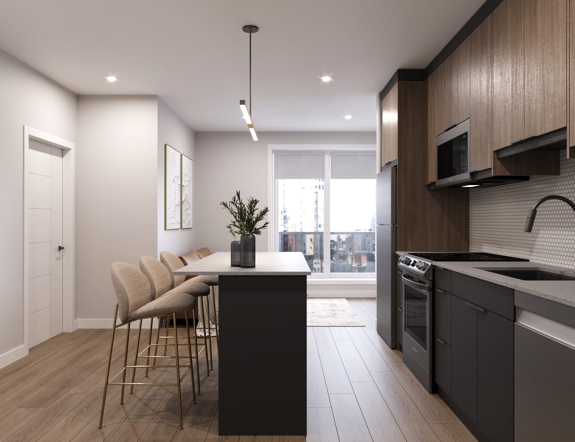 Modern, dark kitchen with kitchen island with bar stools. Located at The Cornerstone.